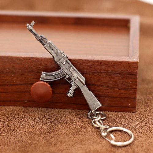 2017 New game M16 Novelty Items AK47 Guns Keychain pendant Trinket M4A1 Sniper Key Chain 10 styles Jewelry Souvenirs Gift Men
