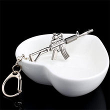 Load image into Gallery viewer, 2017 New game M16 Novelty Items AK47 Guns Keychain pendant Trinket M4A1 Sniper Key Chain 10 styles Jewelry Souvenirs Gift Men